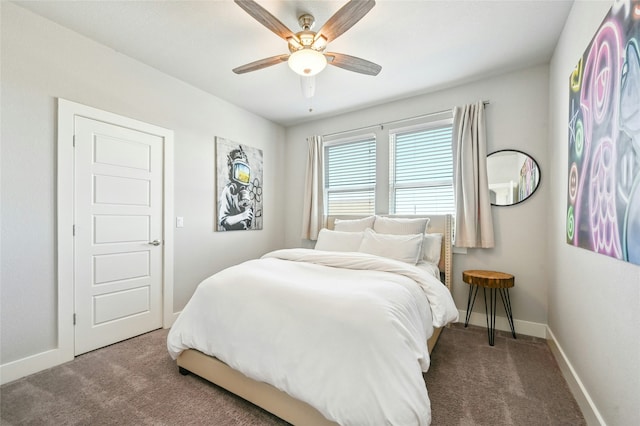 bedroom with ceiling fan and carpet