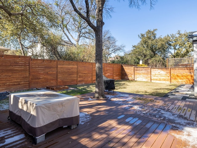 wooden terrace with a yard