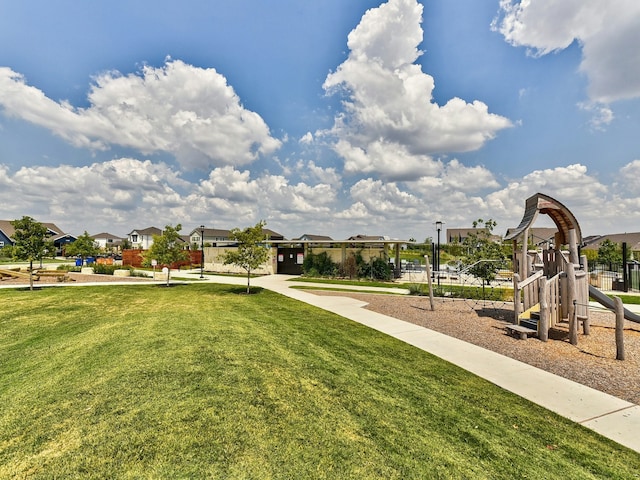 view of jungle gym with a yard