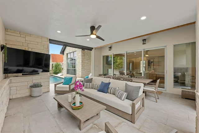 view of patio featuring an outdoor hangout area and ceiling fan