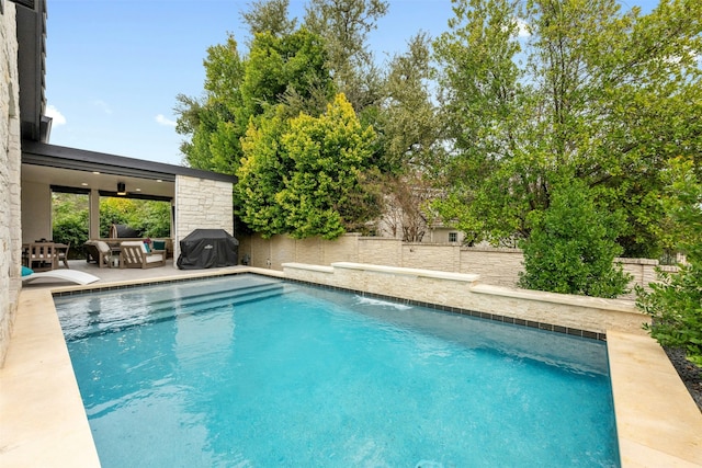 view of swimming pool featuring a patio, an outdoor hangout area, and area for grilling