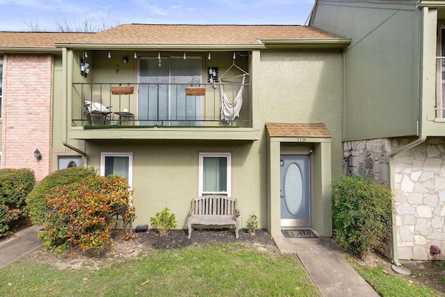 exterior space featuring a balcony