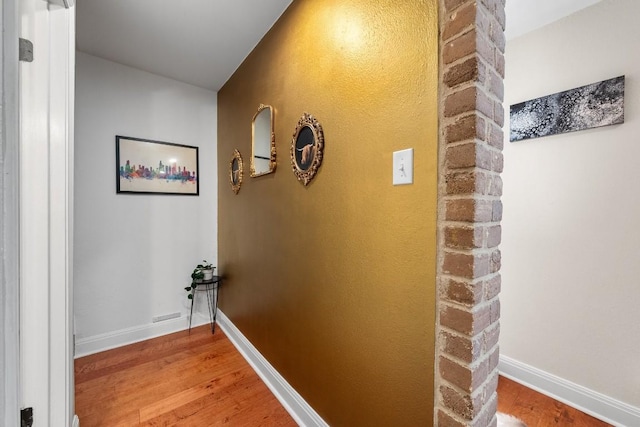 9009 N Plz Unit 118, Austin, TX 78753 - hallway with light wood finished floors and baseboards