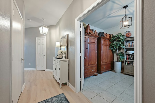 corridor featuring light hardwood / wood-style flooring