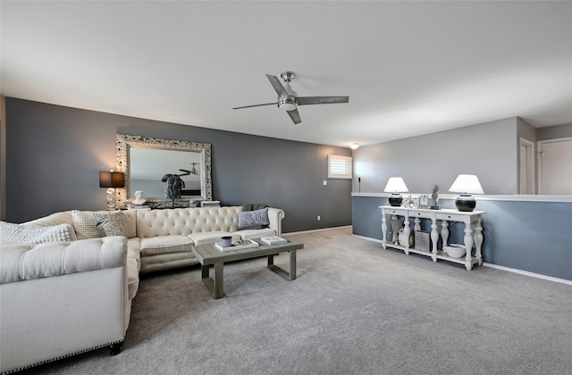 carpeted living room featuring ceiling fan