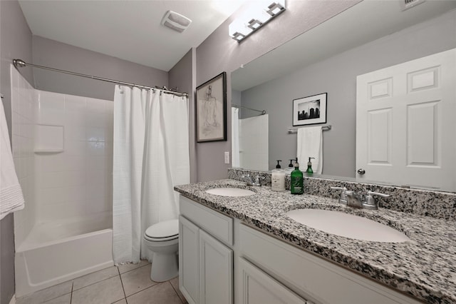 full bathroom featuring tile patterned floors, toilet, shower / tub combo, and vanity