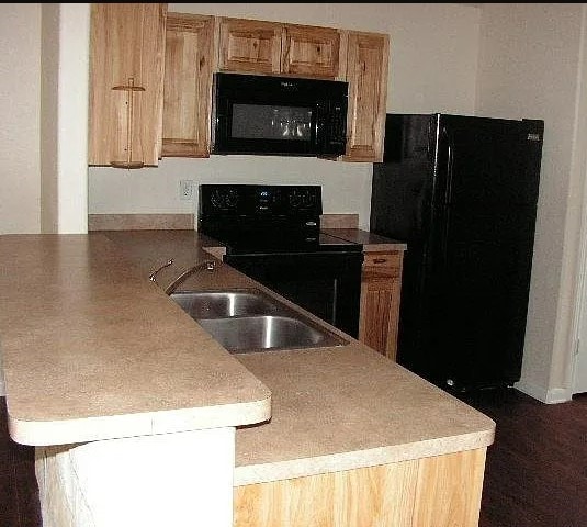 kitchen with black appliances