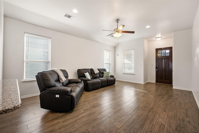 living room with lofted ceiling, a healthy amount of sunlight, and ceiling fan