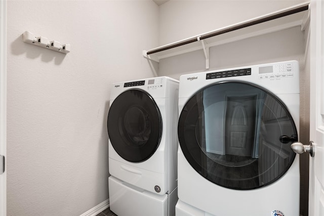 laundry area featuring washing machine and dryer