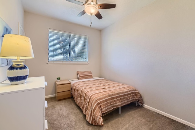 bedroom with light colored carpet and ceiling fan