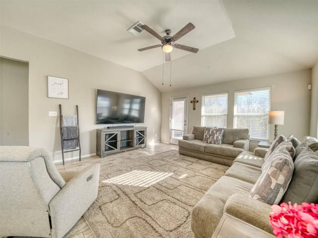 living room featuring lofted ceiling, light wood-type flooring, and ceiling fan