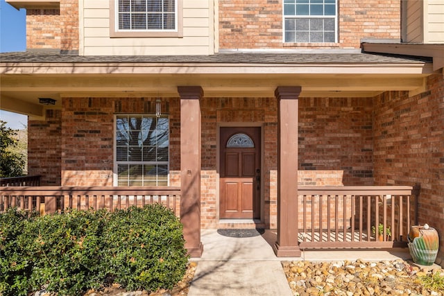 entrance to property with covered porch