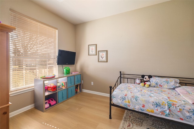 bedroom featuring light hardwood / wood-style floors