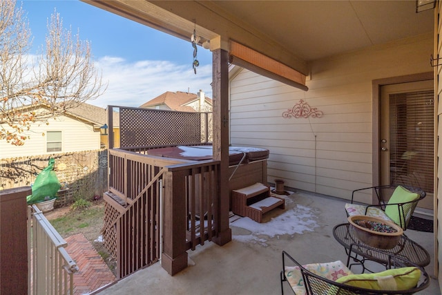 view of patio with a hot tub