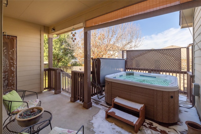 view of patio / terrace featuring a hot tub