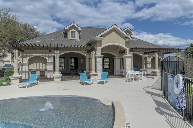 back of house with a patio and a pergola