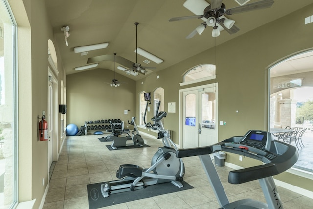 exercise room featuring french doors, high vaulted ceiling, and ceiling fan