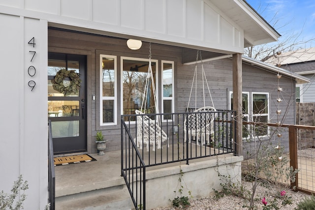 doorway to property with a porch