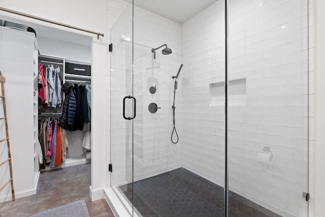 bathroom featuring concrete flooring and walk in shower