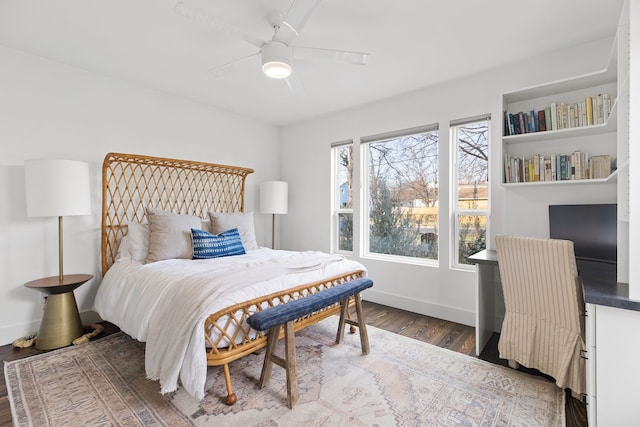 bedroom featuring ceiling fan and hardwood / wood-style flooring