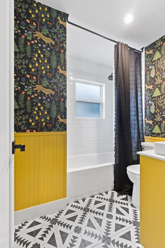 full bathroom with toilet, vanity, shower / bathtub combination with curtain, and tile patterned flooring