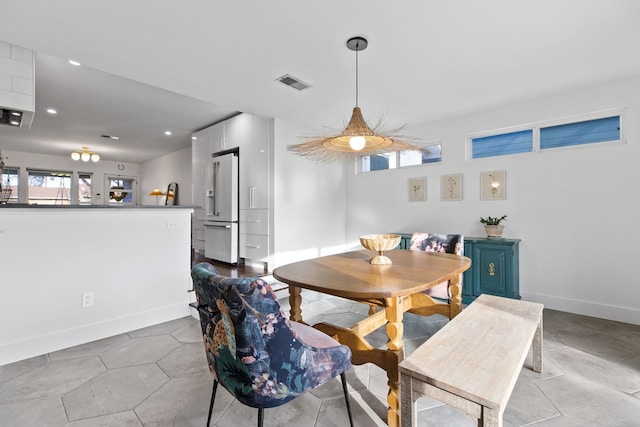 dining area featuring plenty of natural light