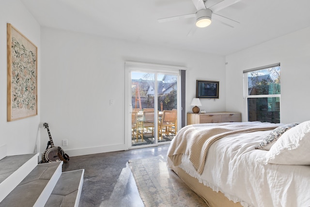 bedroom with ceiling fan and access to outside