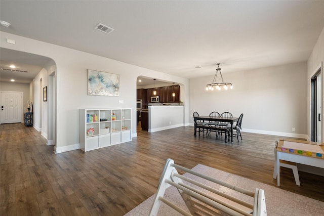 dining area featuring dark hardwood / wood-style floors