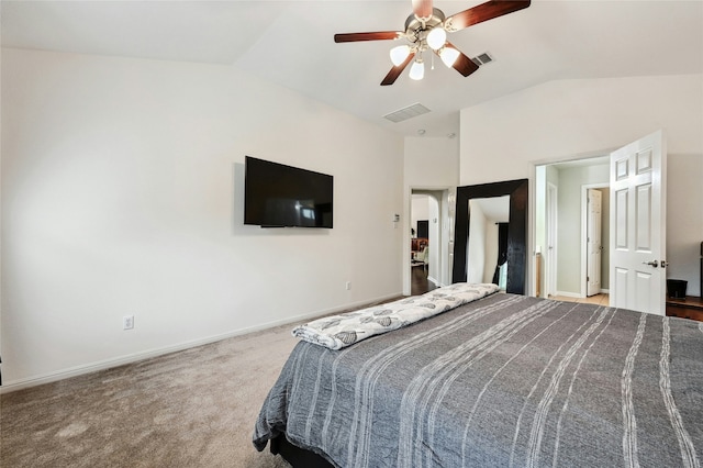 bedroom with carpet, visible vents, vaulted ceiling, and baseboards