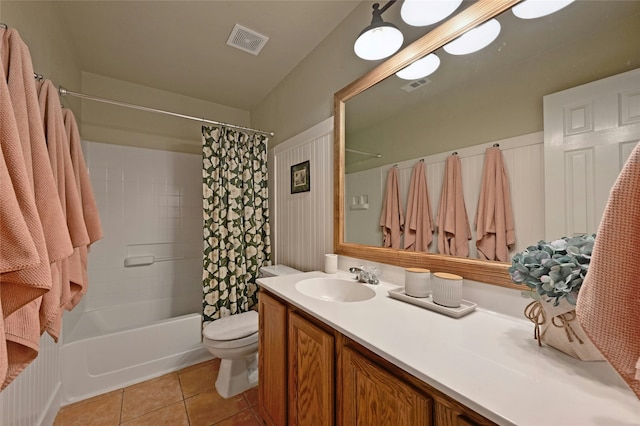 full bath featuring toilet, tile patterned flooring, visible vents, and vanity