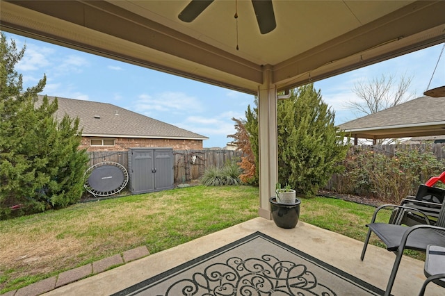 view of patio featuring ceiling fan and a fenced backyard