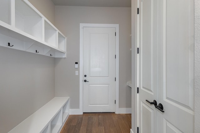 mudroom with dark hardwood / wood-style floors