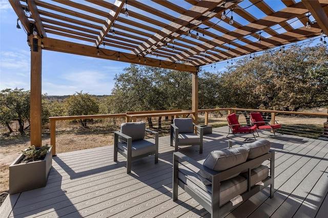 wooden deck featuring outdoor lounge area and a pergola