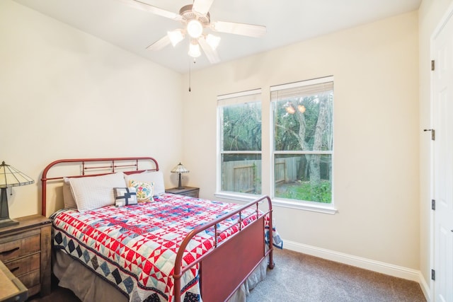 bedroom with ceiling fan and carpet flooring