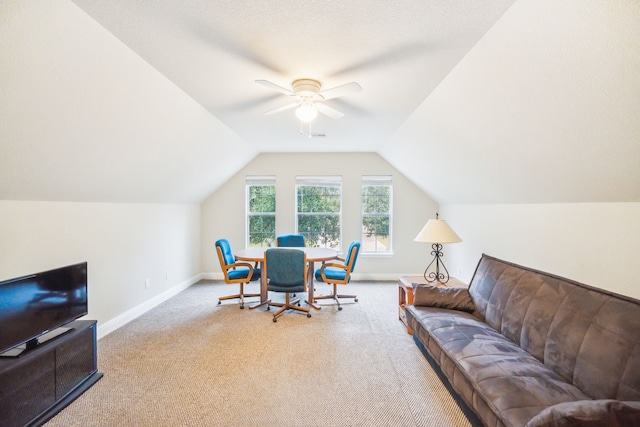 office space with lofted ceiling, light colored carpet, and ceiling fan