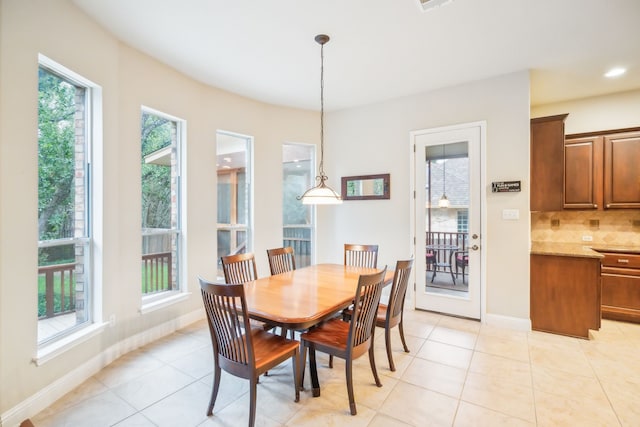 view of tiled dining space