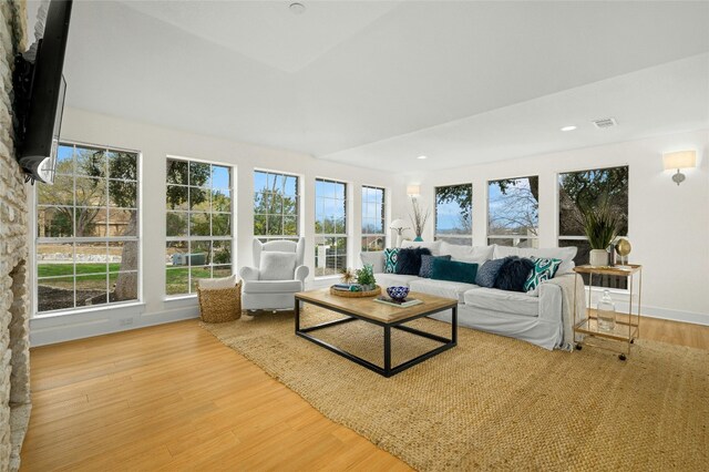 unfurnished living room featuring light hardwood / wood-style flooring