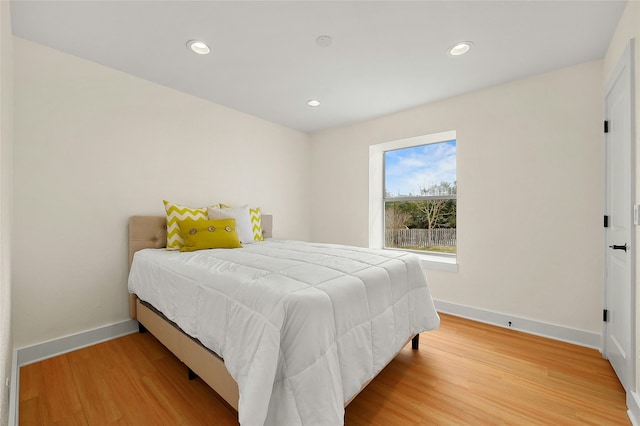 bedroom featuring hardwood / wood-style flooring