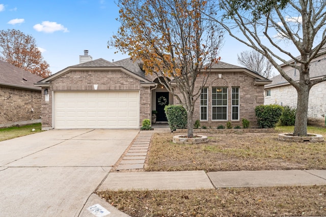 ranch-style house featuring a garage