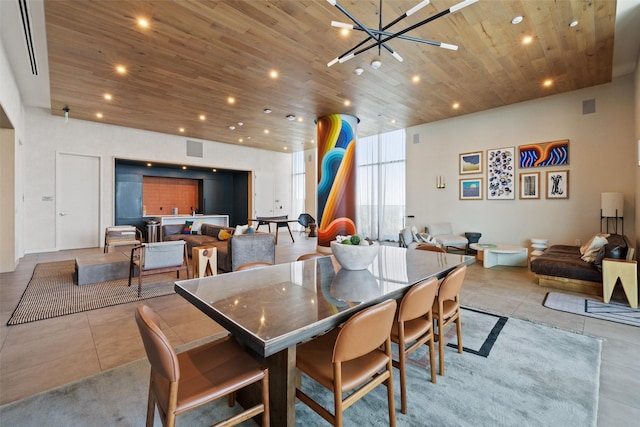 dining area with an inviting chandelier