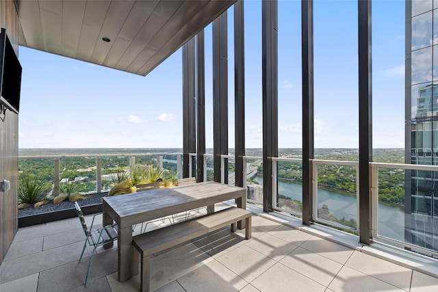 balcony featuring a water view