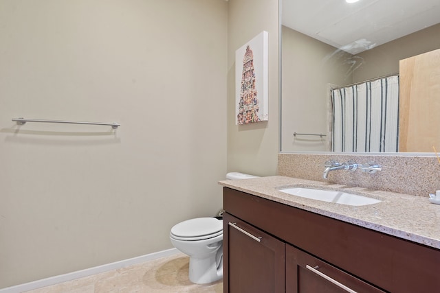 bathroom featuring vanity, toilet, curtained shower, and tile patterned flooring