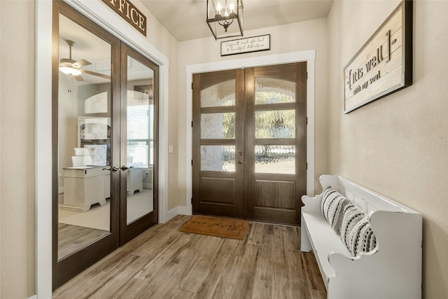 doorway to outside with hardwood / wood-style flooring and french doors