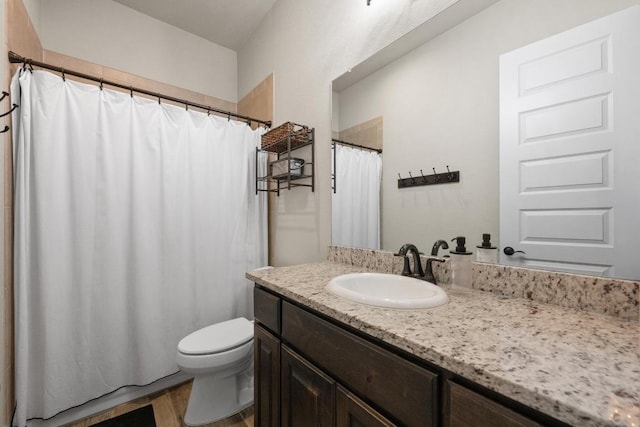 105 Aldea St, Georgetown, TX 78633 - bathroom featuring wood finished floors, vanity, and a shower with curtain