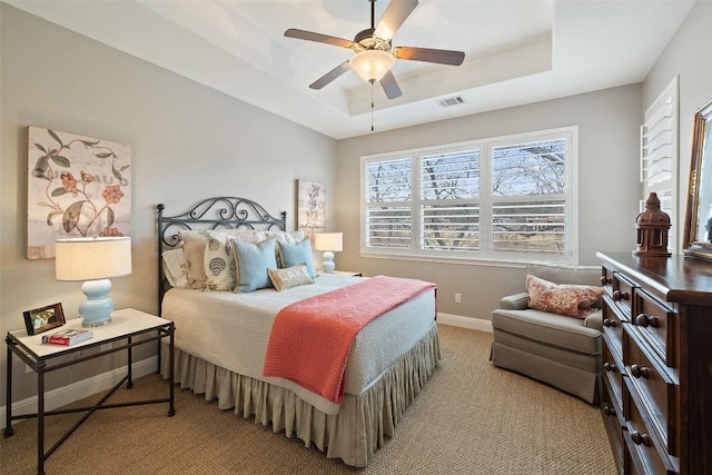 2007 Big Horn Dr, Austin, TX 78734 - bedroom with a raised ceiling, light colored carpet, baseboards, and ceiling fan