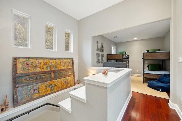2007 Big Horn Dr, Austin, TX 78734 - hall featuring dark wood-type flooring, baseboards, and recessed lighting