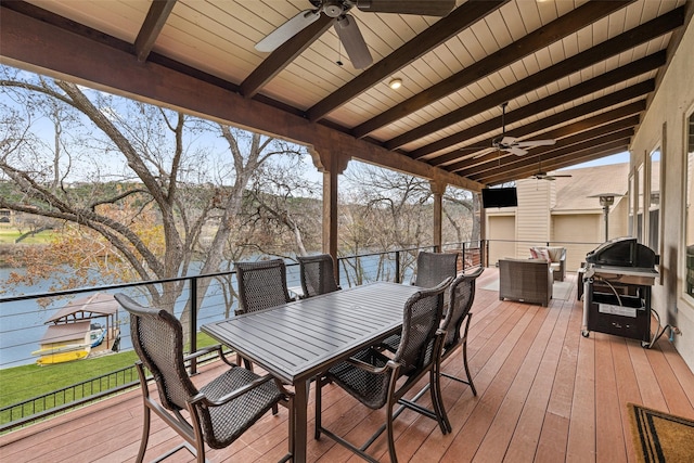 deck with ceiling fan, a grill, and an outdoor living space