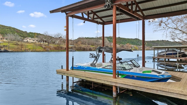 view of dock with a water view