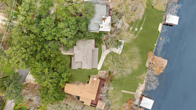 birds eye view of property with a water view