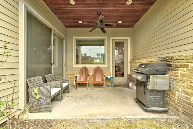 view of patio / terrace with ceiling fan and a grill